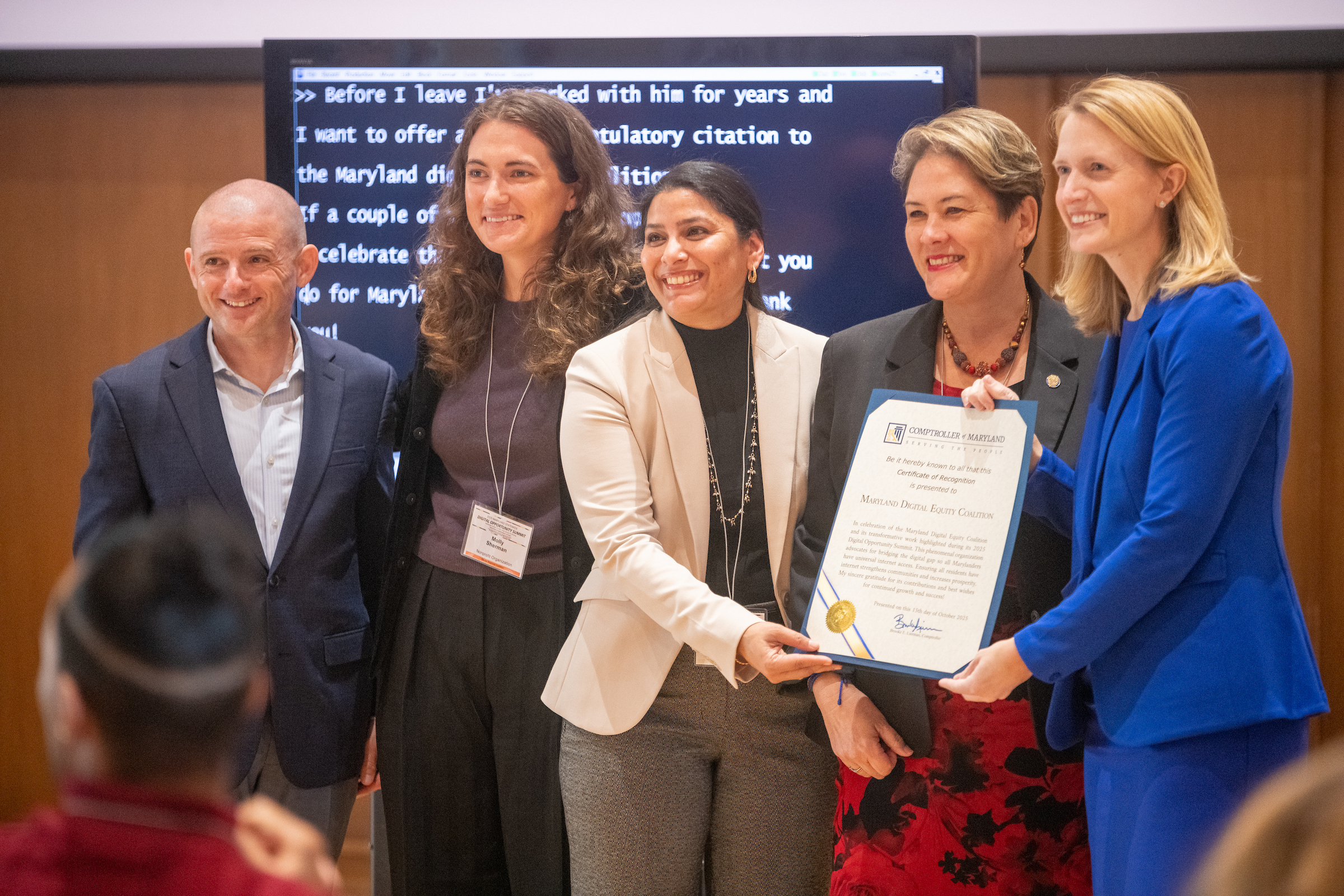  Josh Bokee, Molly Sherman, Vishnupriya Desai, Mistuko Herrera, and Brooke Lierman stand with a Digital Opportunity Citation.&nbsp;